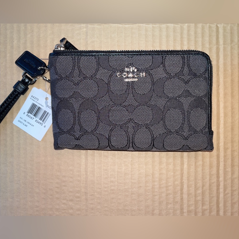 NWT. Coach Wristlet. Black with Silver Hardware.